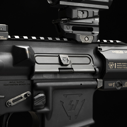 Strike Industries - Tłoczona klapka okna wyrzutnika łusek do AR-15 - Stalowa - Czarna - SI-AR-SUDC-223